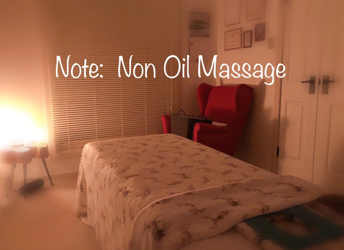 Cozy massage room with soft lighting